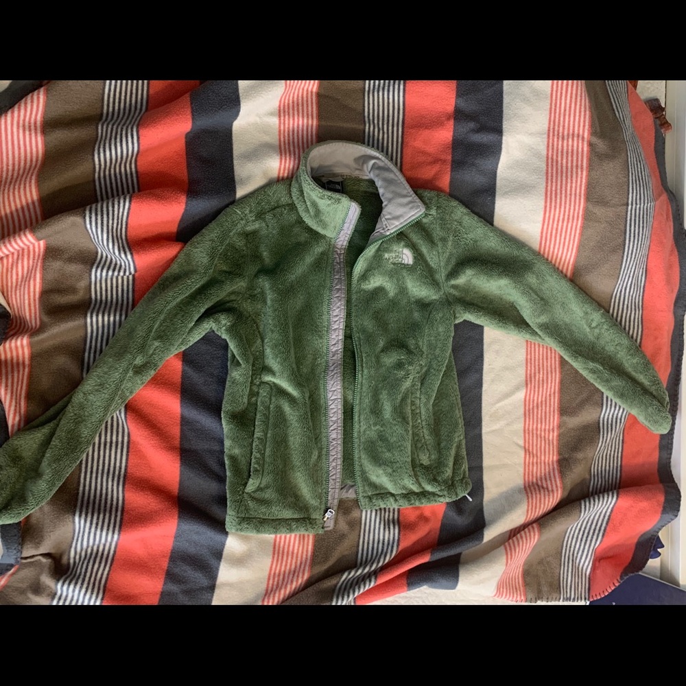 Green furry north face jacket